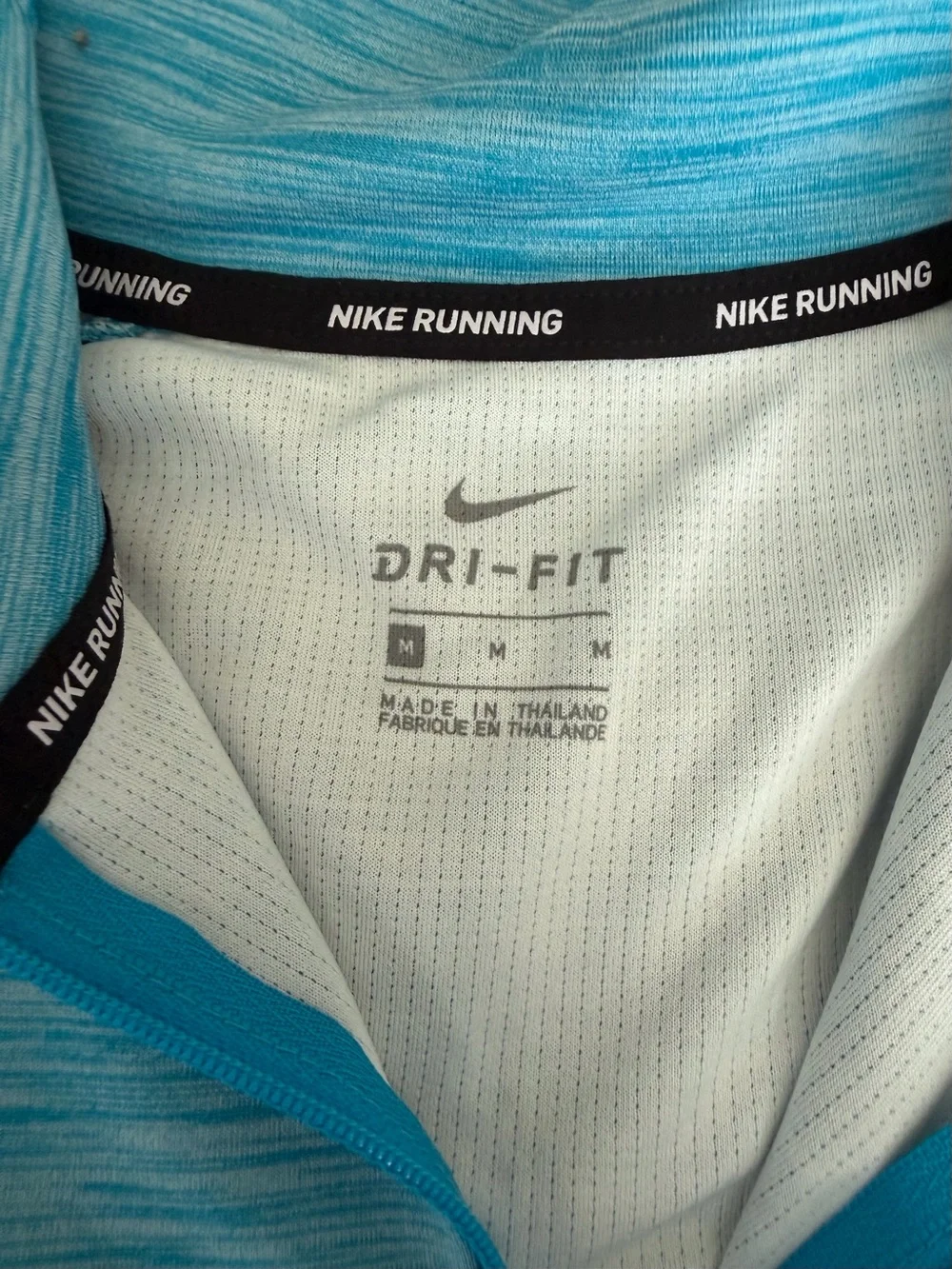 Women’s Nike Light Blue Quarter-Zip Long Sleeve Athletic Top